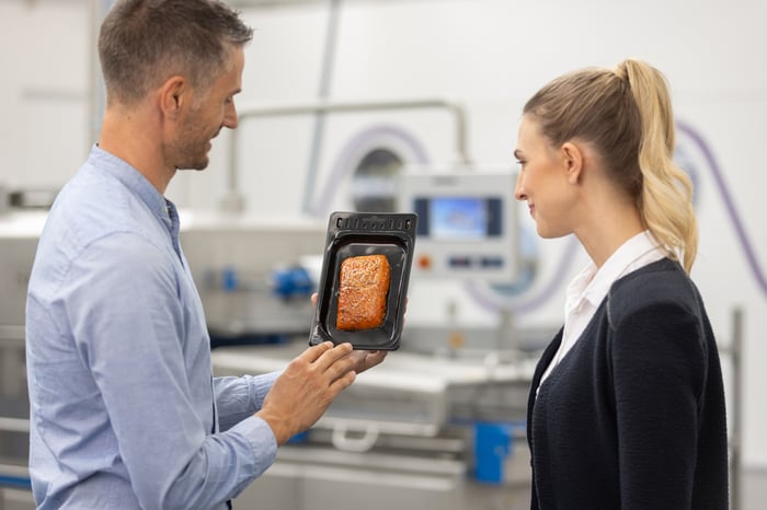 Skin film packaging for meat